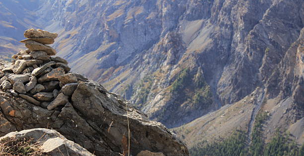 Cairn with Col du Vallonet in background stock photo