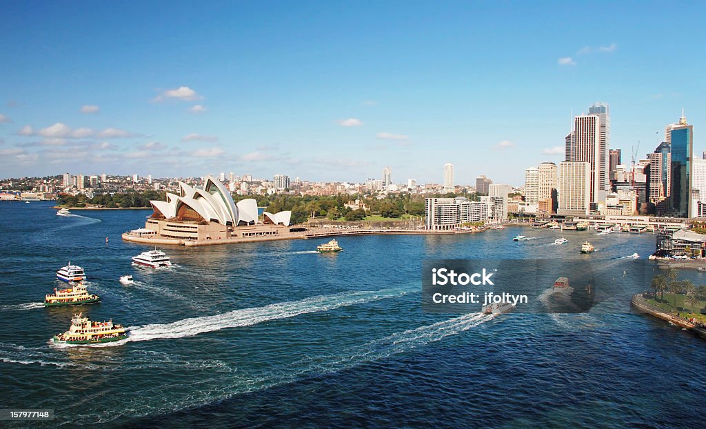 Shores and cityscape of Sydney, Australia Sydney Opera House with ferrys in foregournd, taken from Harbour bridge Sydney Opera House Stock Photo