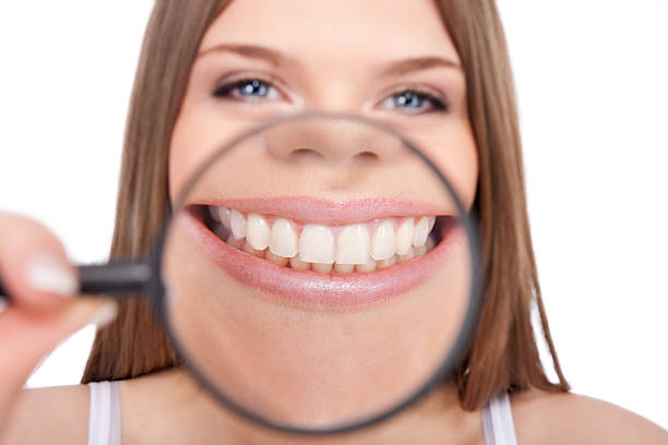 istock woman showing her healthy teeth 157977791