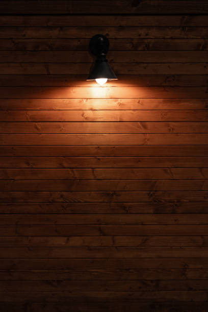 istock Light on the Wooden Wall 1579783946
