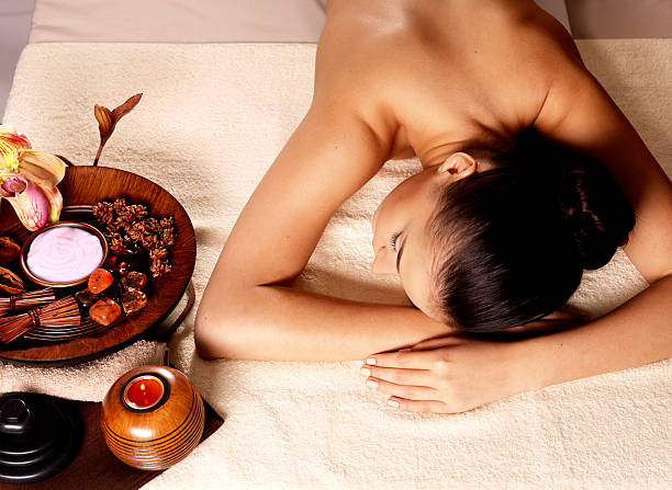 istock woman after massage in spa salon 157980859