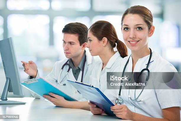 Medical Students Stock Photo - Download Image Now - Healthcare And Medicine, Assistant, Medical Exam