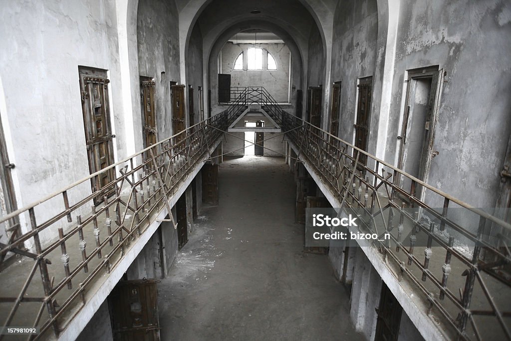 Abandoned prison Color picture of an old abandoned prison Corridor Stock Photo