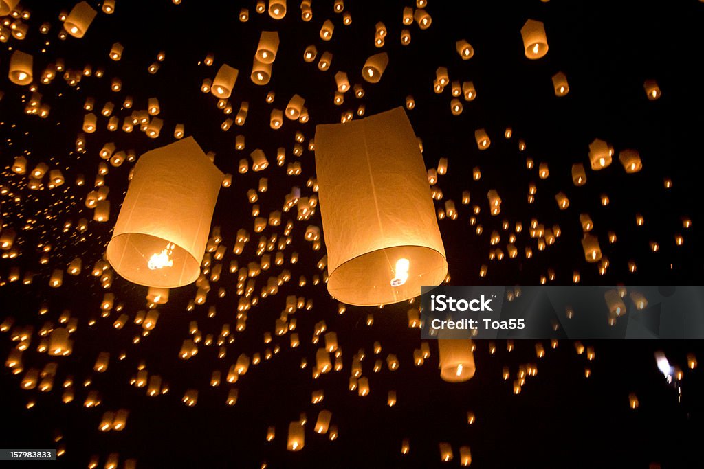 Floating asian lanterns Yee Peng festival, Buddhist floating lanterns to the Buddha in Sansai district, Chiang Mai, Thailand. Asia Stock Photo