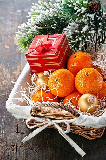 istock Mandarins in basket with Gift 157985923