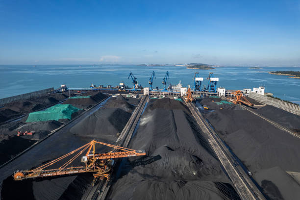 istock The port with coal is piled by the sea 1579865325