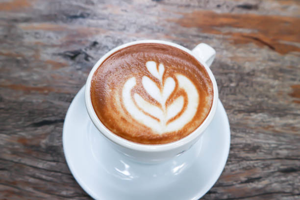 istock hot cofffee, cappuccino coffee or latte coffee or flat white or latte art 1579869645