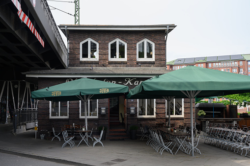 Hamburg, Germany - June 16 2023: Oberhafenkantine Restaurant and Pub Exterior of a Skew and Crooked  Brick Building