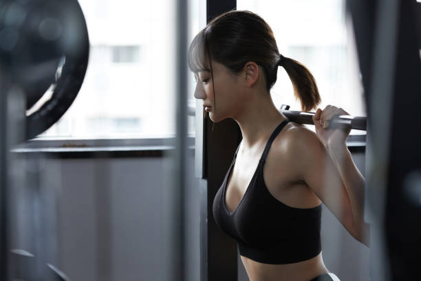 Young Asian woman working out at the gym indoor women boxing sport exercising stock pictures, royalty-free photos & images
