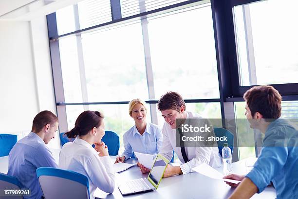 Business Team Laughing In A Meeting At The Office Stock Photo - Download Image Now - Adult, Backgrounds, Business