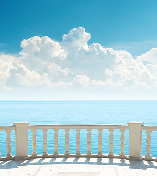istock balcony near sea and clouds over it 157990249