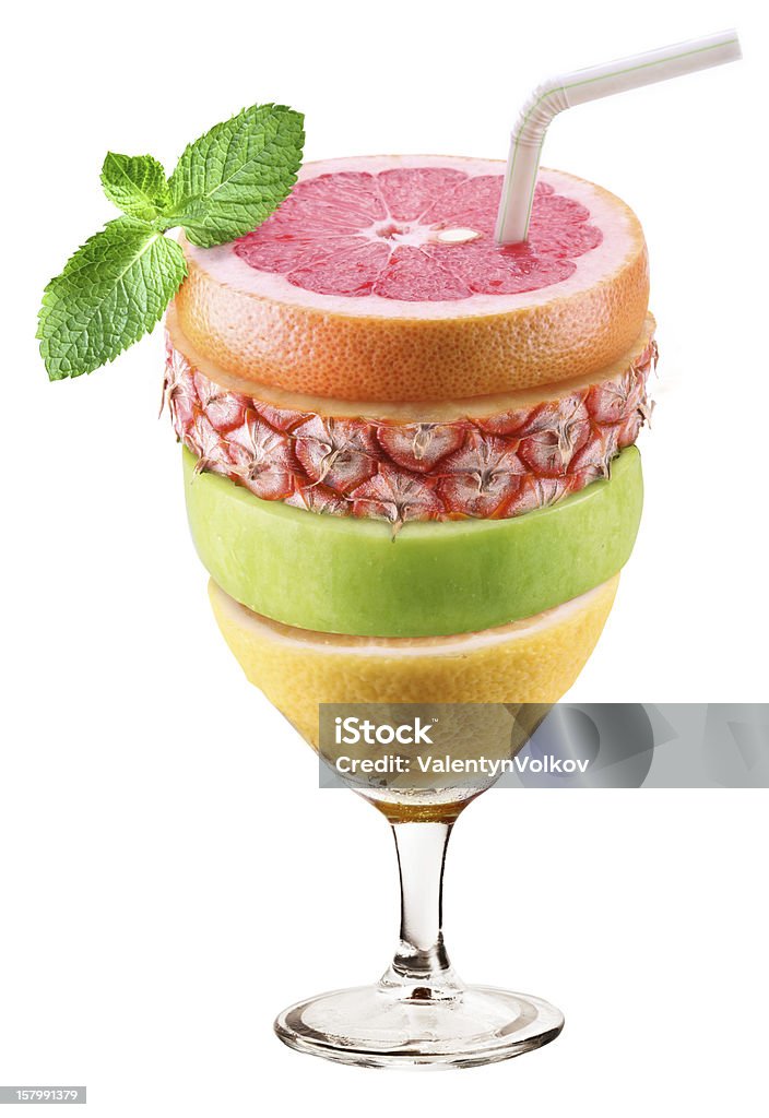 Glass of juice, consisting layers fruit. Glass of juice, consisting of layers of fruit. Isolated on a white background. Apple - Fruit Stock Photo