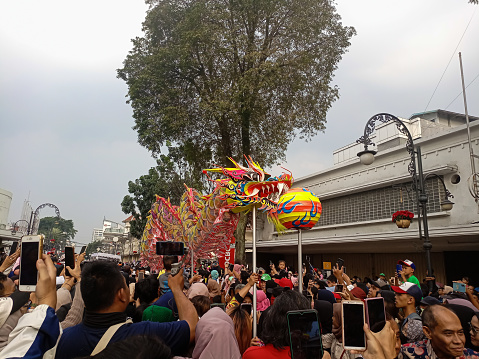 Participants of the commemorative carnival of the Asian-African as Asia Africa Carnival to commemorating Asian African Conference at Asia Africa Street Bandung.\nBandung-Indonesia July 29 2023