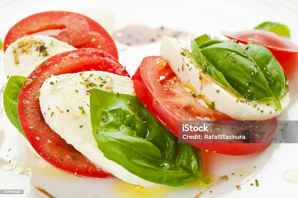 Insalata Caprese - Foto stock royalty-free di Aceto