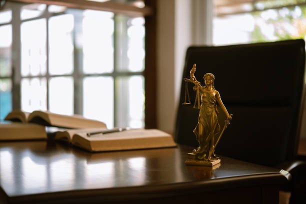 law education scales of justice on judge's desk. law education of jurisprudence  constitution and governance, law library stock pictures, royalty-free photos & images