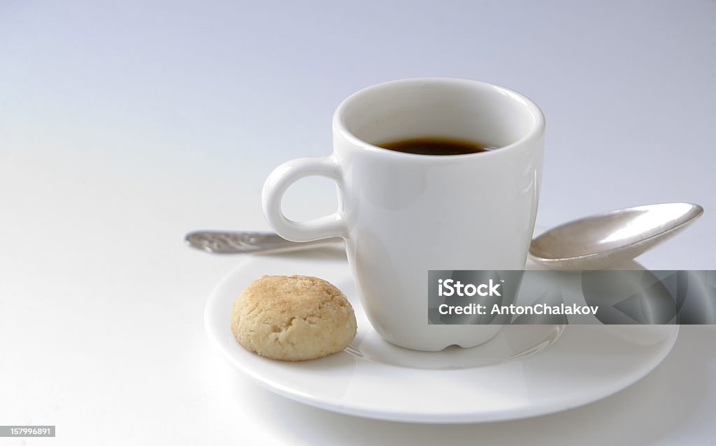 Être né avec une cuiller d'argent à Expresso et biscuits - Photo de Biscuit libre de droits