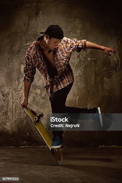 Skater Doing A Trick Stock Photo - Download Image Now - Skateboard, Activity, Adult