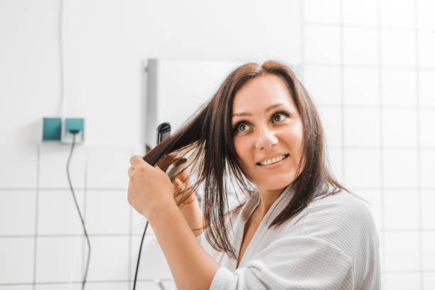 istock Woman using energy in the bathroom 1579999517