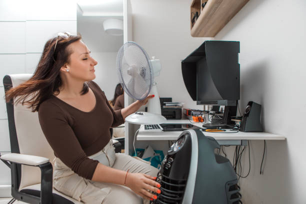 istock Woman using energy in the home office 1580000551
