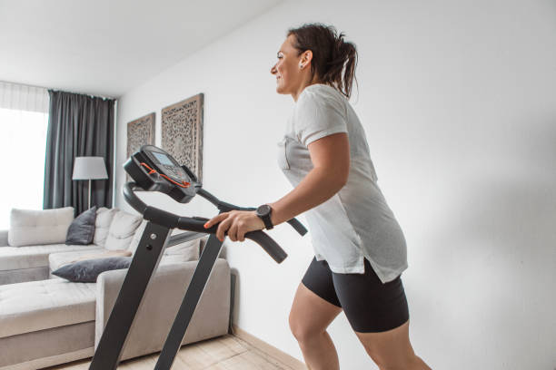 istock woman using energy whilst working out in the home 1580005788