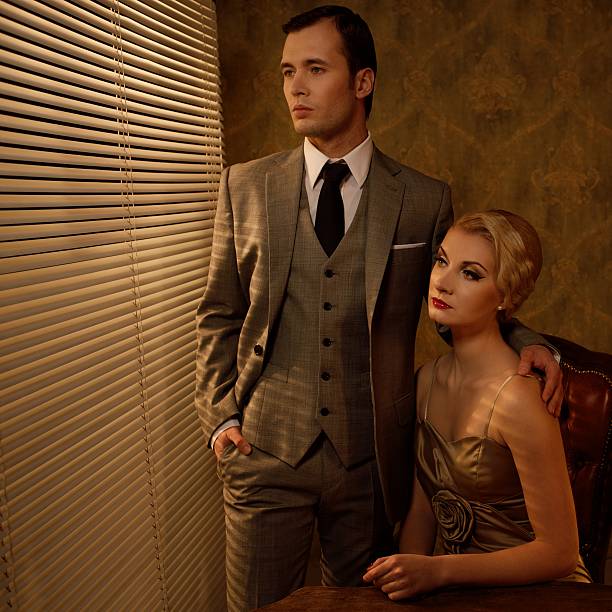 istock Retro couple near a window 158000943