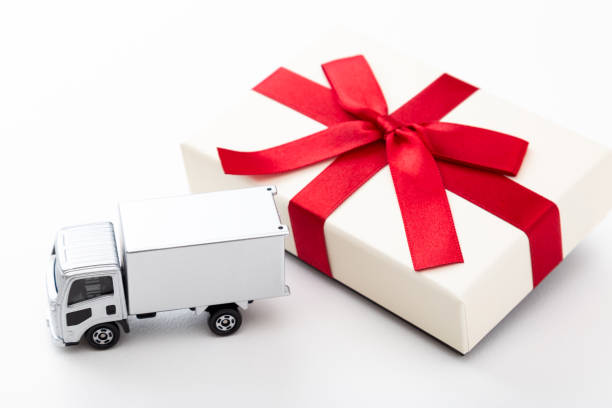 istock Delivery truck and gift box. 1580028572