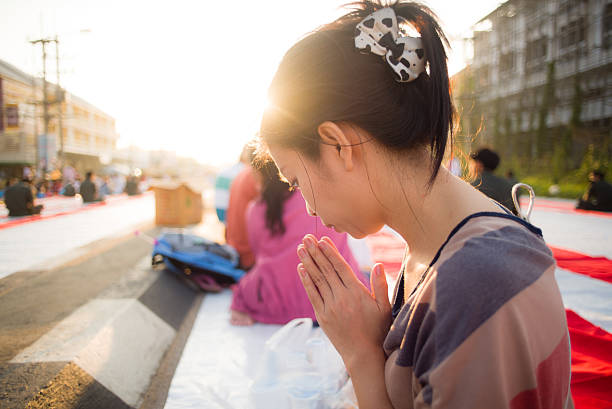 istock woman Put palms of the hands 158003656