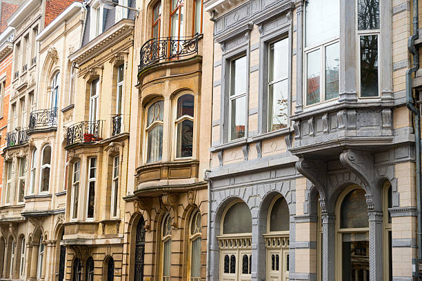 Houses in Brussels Detailed view of typical town houses in the City of Brussels, Saint-Gilles district, Belgium. houses in brussels stock pictures, royalty-free photos & images
