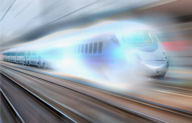 istock Blue high speed train runs on rail tracks - The train is going too fast as a result the air pressure is causing too much heat at the front 1580052274