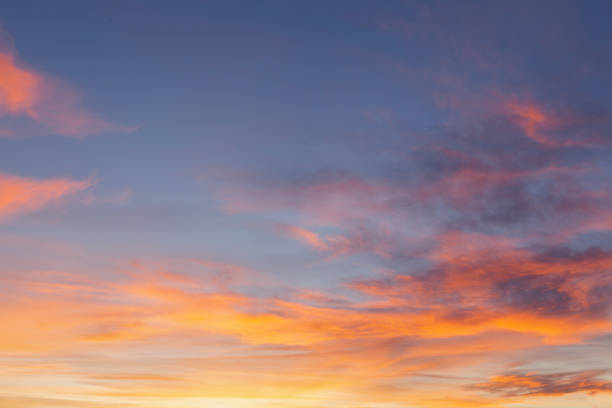istock Amazing sunset with pink clouds and blue sky 1580062740