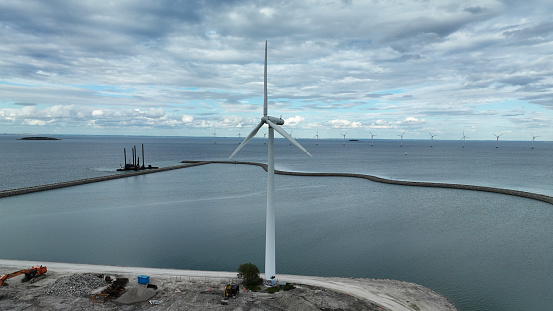 Wind turbine renewable energy in the sea aerial view