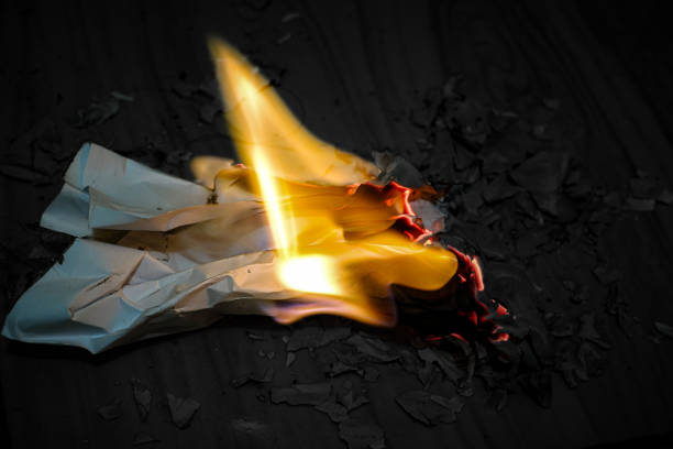 istock Fire from paper that burns in the dark. 1580102627