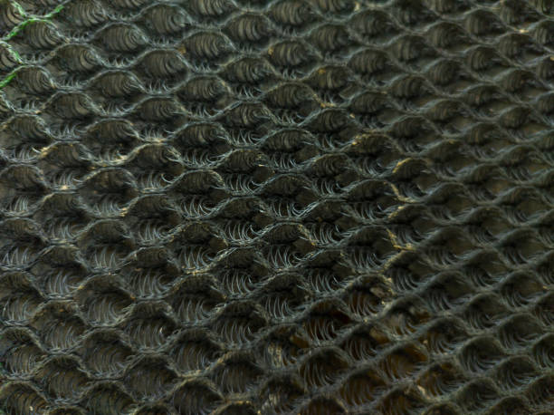 istock dirty mesh fabric details close up 1580165353