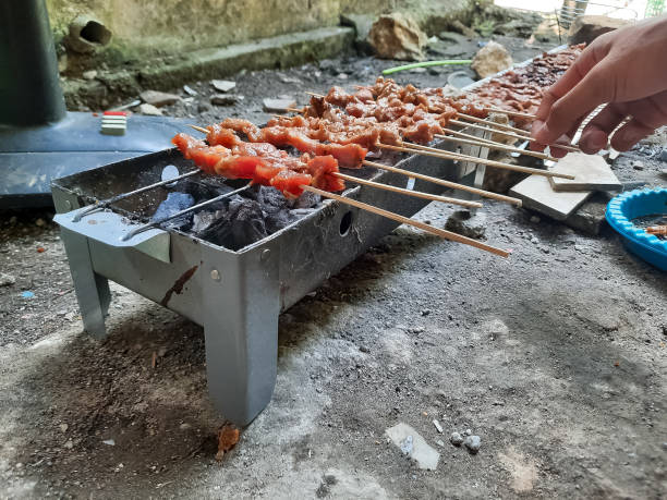 istock Grilled Beef Satay On The Sate Burner Or Satay Grill With Charchoal 1580263126