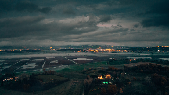 pond aerial view in winter in italy