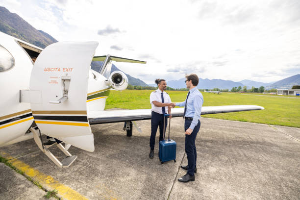 istock One businessman meeting the pilot before private jet flight 1580280219