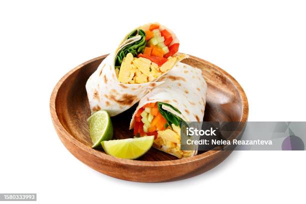 Breakfast Egg Burrito With Fresh Vegetables Stock Photo - Download Image Now - Wrap Sandwich, Vegetable, Burrito