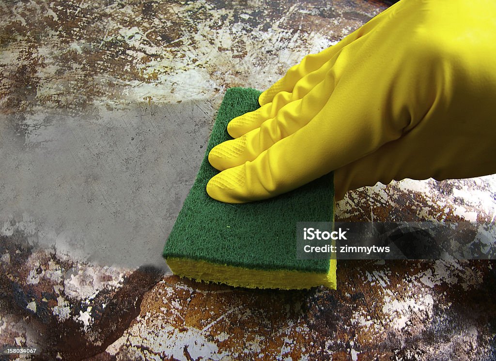 clean it gloved hand scrubbing a dirty metal surface Cleaning Stock Photo