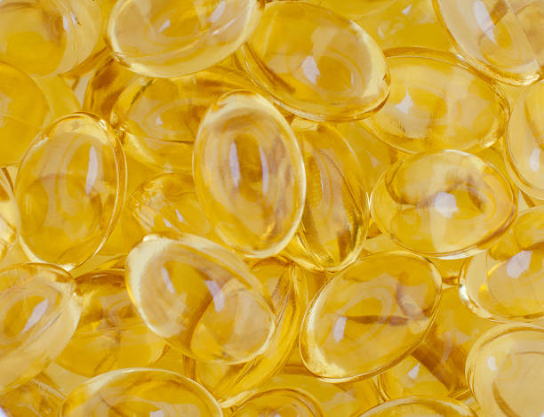 omega 3 - capsule gel effect pill vitamin pill stock-fotos und bilder