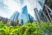 Low angle view of modern buildings against sky in London