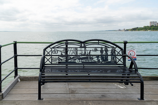 Seats on the pier in Southend, England, UK.  Southend has the longest entertainment pier in the world.