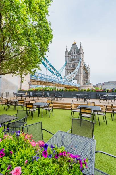istock Tower bridge in London with cafe in foreground. 1580404313