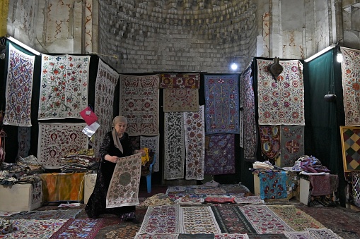 Bukhara, Uzbekistan - April 10, 2023 - Carpets are a great Uzbek souvenir. Khiva, Bukhara, Samarkand, Kokand, Shakhrisabz, and Karakalpakstan all make rugs with different techniques and designs.