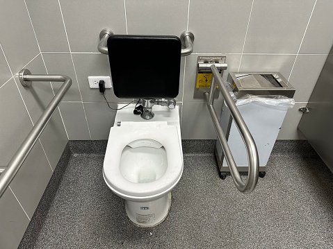 Toilet special equipment for disable person. The Chinese character means is how to use