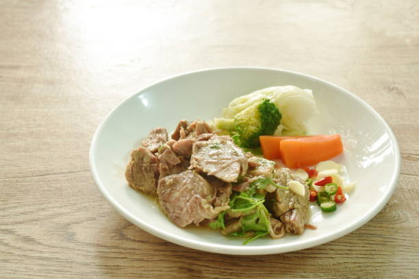 istock steamed slice pepper pork with vegetable and garlic 1580553101