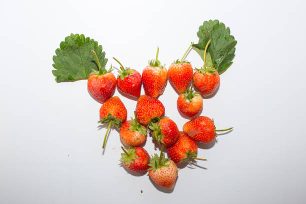 Fresh organic strawberry red fruit on white background real vitamin fruit