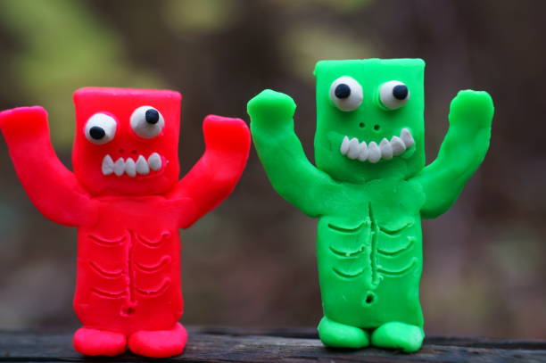 istock Funny monster made of plasticine. Figures for Halloween. 1580570162