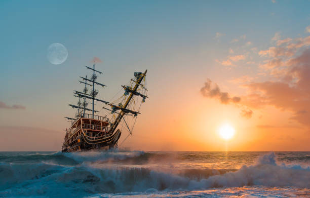 istock Sailing old ship in a storm sea in the background stormy clouds 1580606586