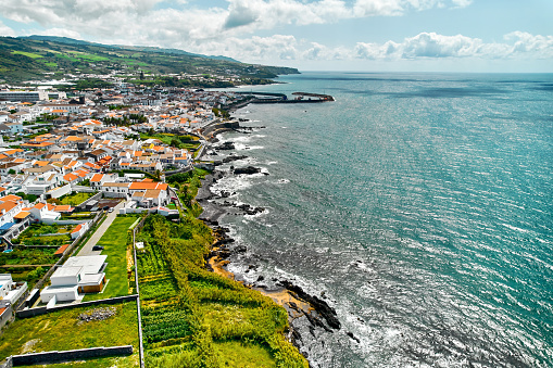 Aerial shot, drone point of view of Ribeira Grande town in the Ponta Delgada island. Sao Miguel, Azores, Portugal. Travel destinations and tourism concept