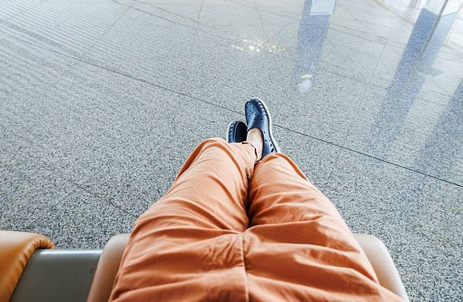 Men Wear Sandal Sitting on Hall